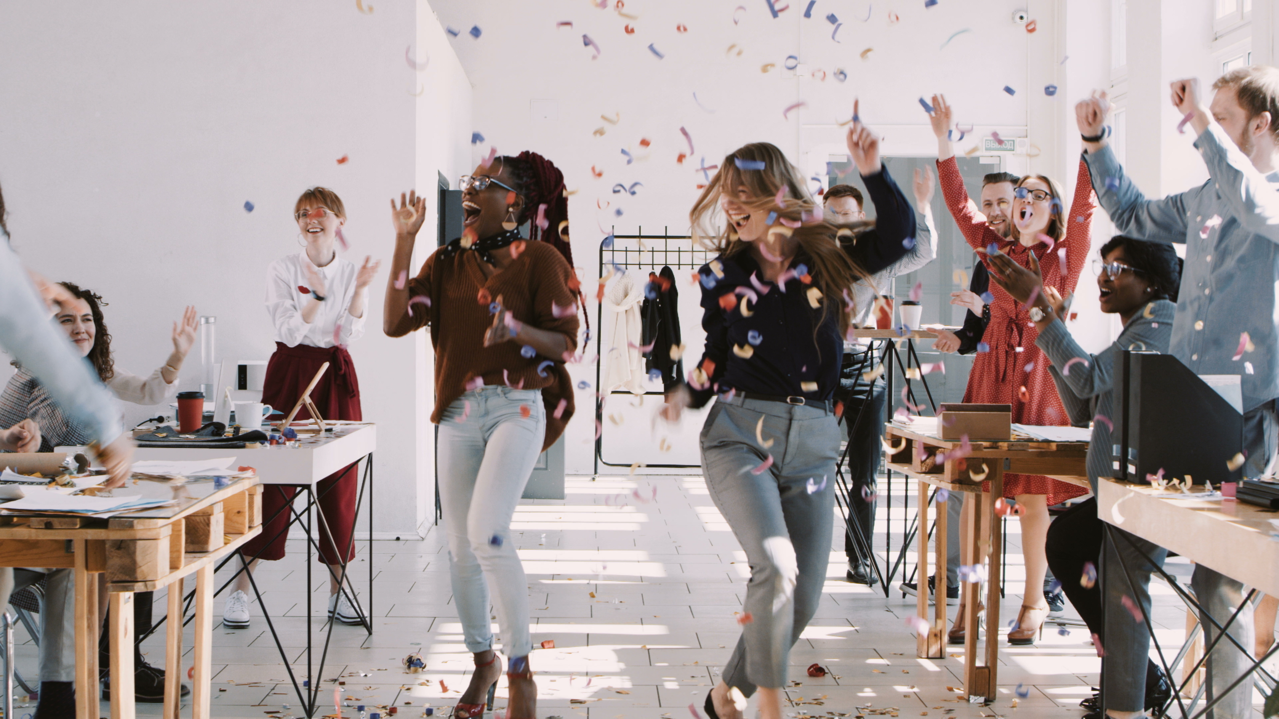 office workers dancing at an office party