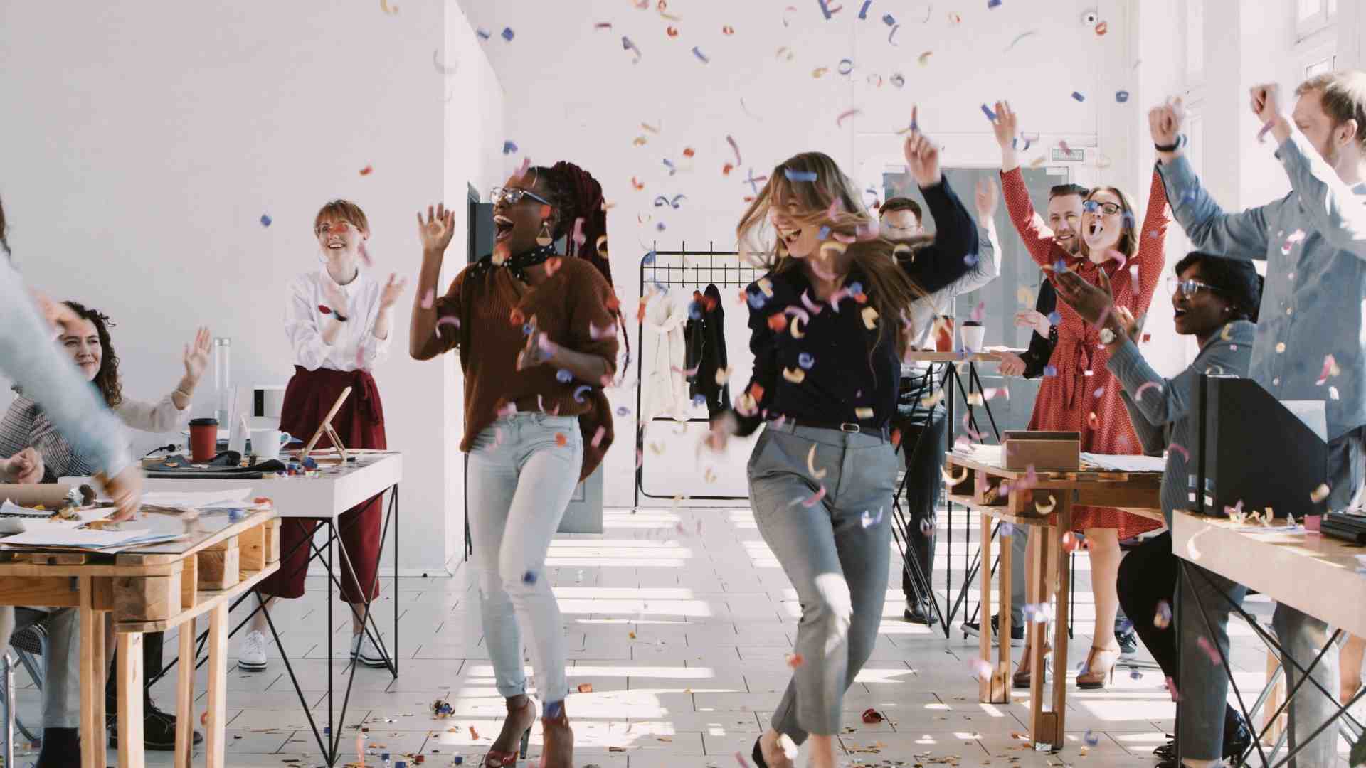 office workers dancing at an office party